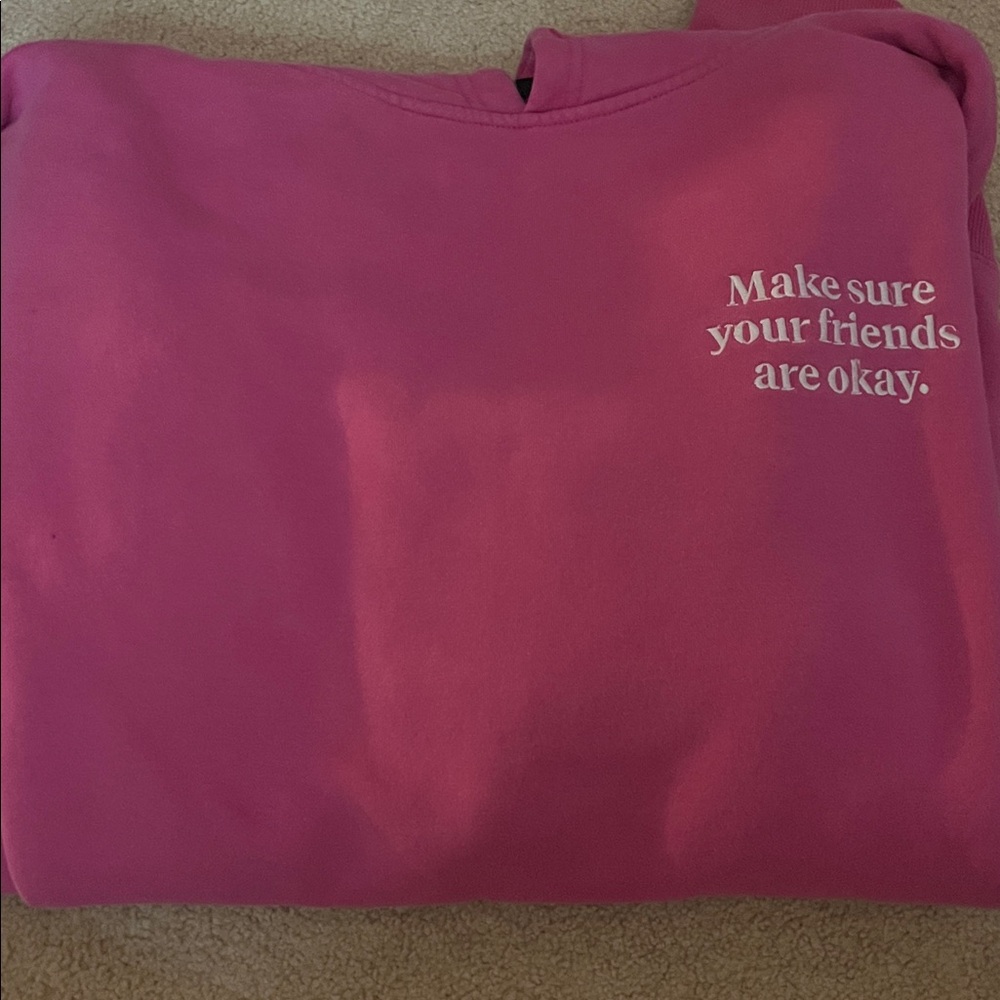 Vibrant Pink Hoodie with Uplifting Message